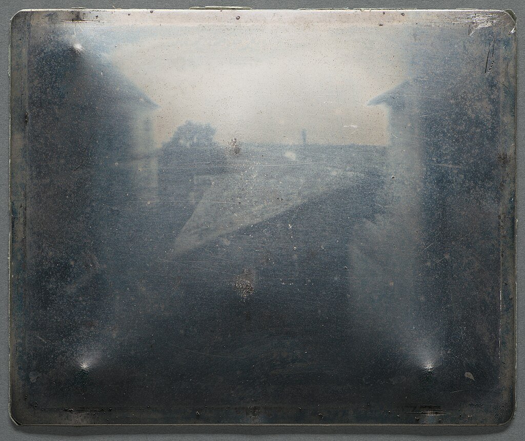 One of the first photographs ever taken. The photo is of a view from a window.