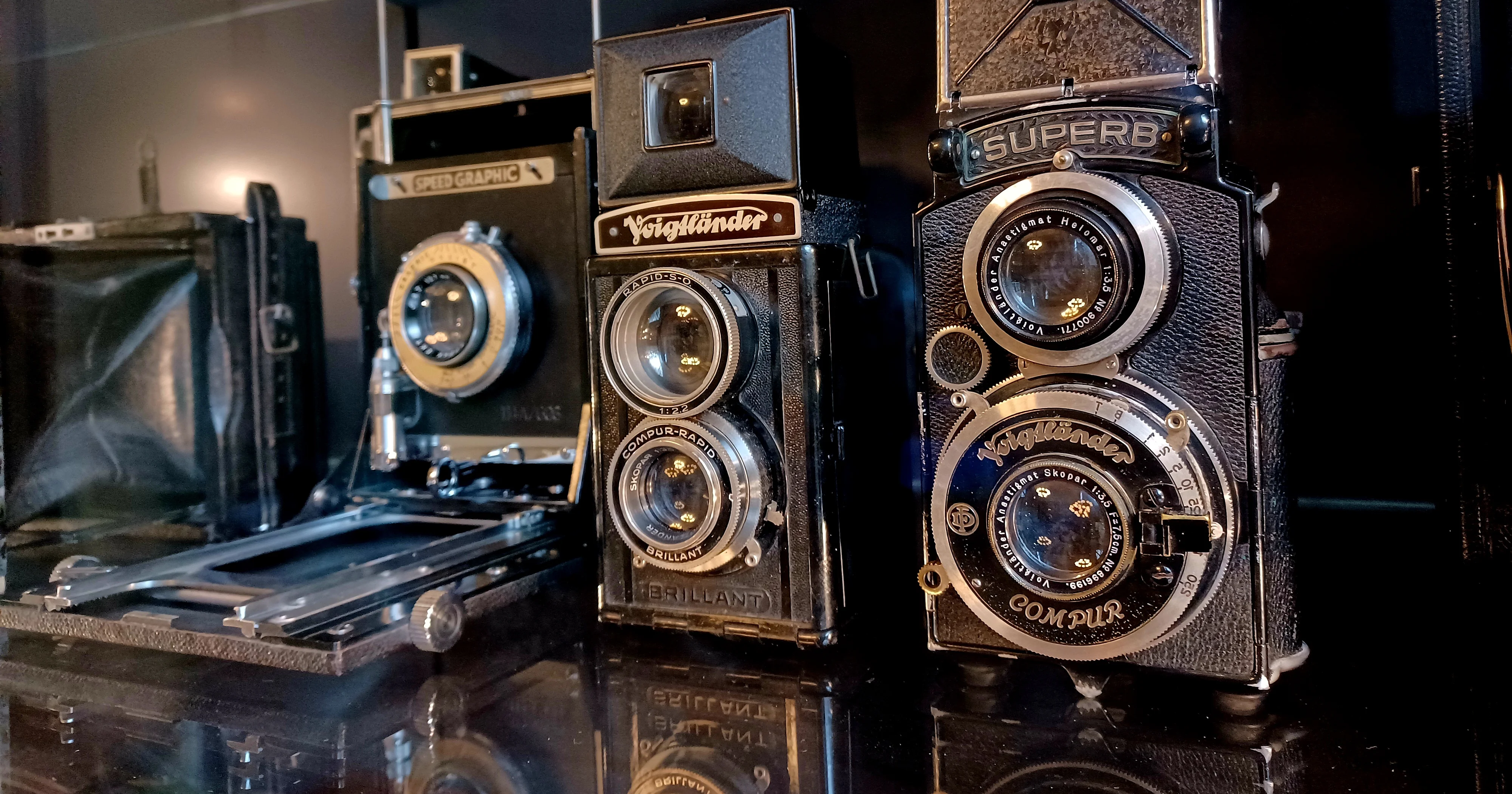 Image shows some of the earliest cameras ever mass produced. They are in really good condition and their aesthetics are beautiful. These can be viewed in the Victoria & Albert Museum in London.