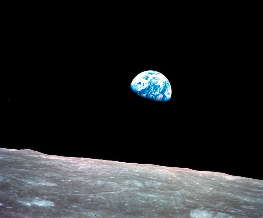 A truly amazing and inspiring photo of the bright blue planet in the deep dark space. It looks like a glowing marble.